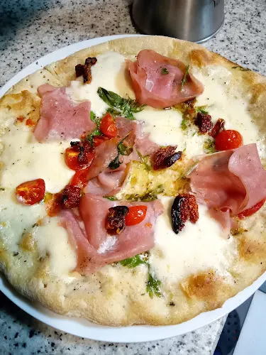 Restaurante Pizzería Paralelo - Lena