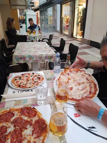 pizzeria Italiana "La Romana" y Sala MultiEventos Caroll's disco